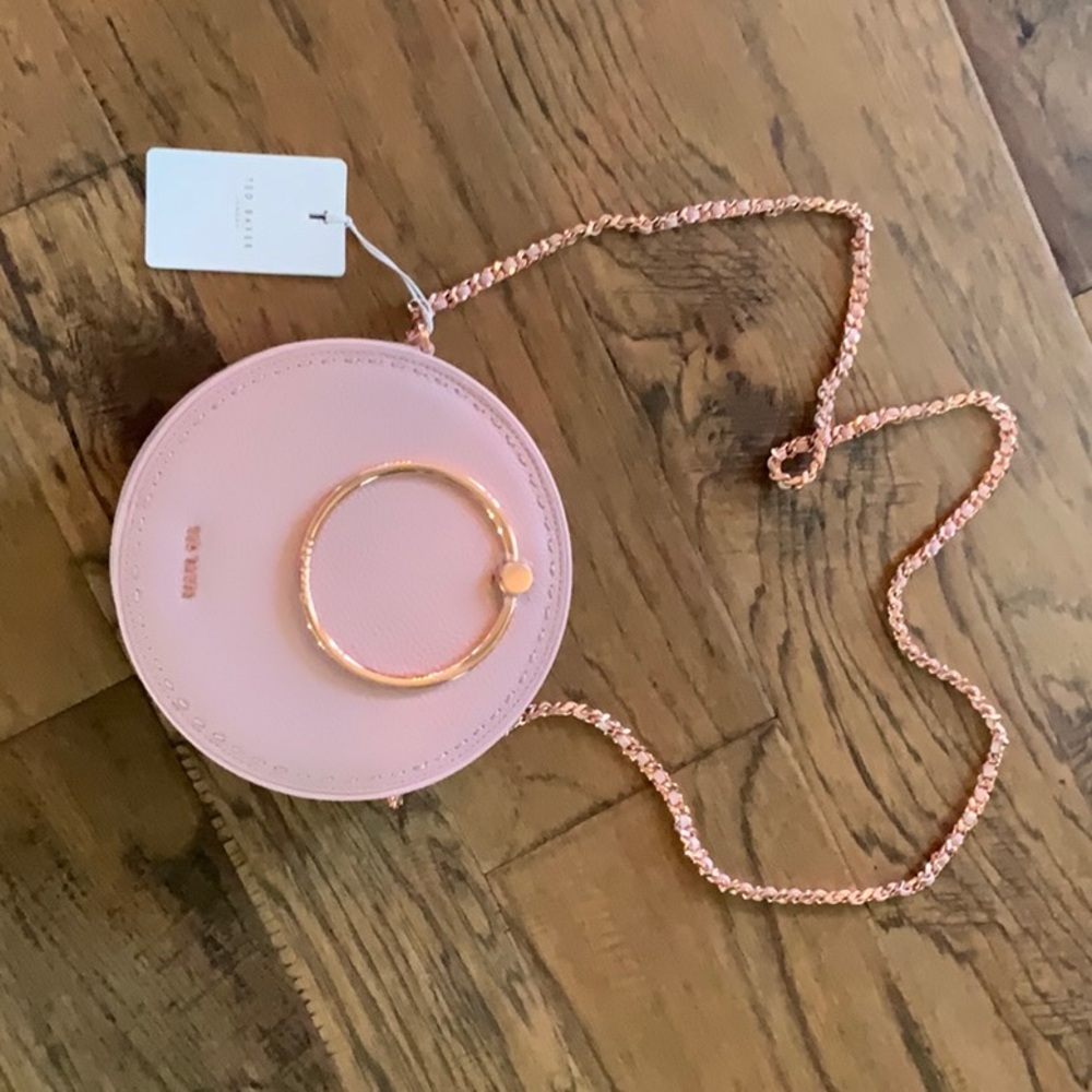 Beautiful round pink pebbled purse by Ted Baker